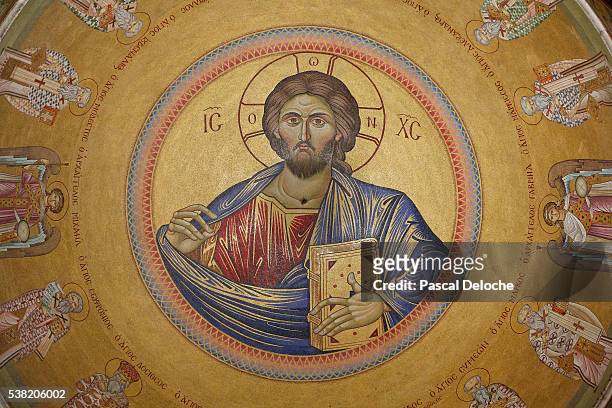 holy sepulchre church. ceiling of the catholicon. christ pantocrator mosaic. - church of the holy sepulchre ストックフォトと画像