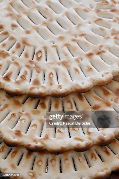 matzoh (unleavened bread) eaten during passover jewish festival. - pesach seder stock pictures, royalty-free photos & images