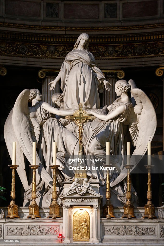 Statues over the high altar in La Madeleine church. Mary Magdalene's death by Charles Marochetti (1806 - 1868).