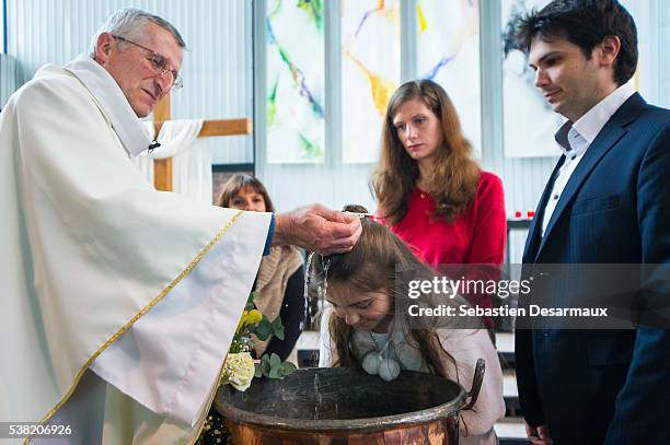 holy week mass. baptism. - catholic baptism stock-fotos und bilder