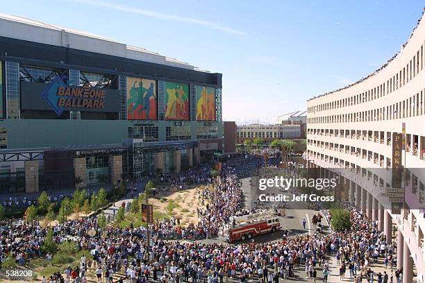 Firetruck carrying the Arizona Diamondbacks makes its way onto Jefferson Street during a parade held to celebrate their World Series victory over the...