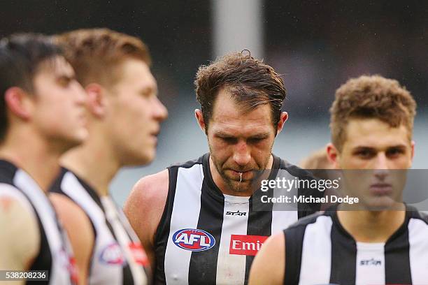 Travis Cloke of the Magpies looks dejected after defeat during the round 11 AFL match between the Collingwood Magpies and the Port Adelaide Power at...