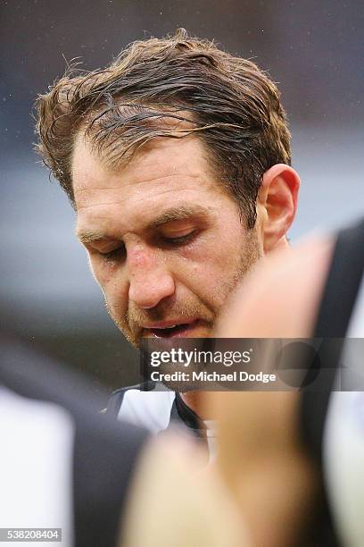 Travis Cloke of the Magpies looks dejected after defeat during the round 11 AFL match between the Collingwood Magpies and the Port Adelaide Power at...