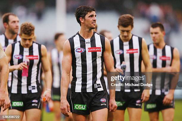 Scott Pendlebury of the Magpies looks dejected after defeat during the round 11 AFL match between the Collingwood Magpies and the Port Adelaide Power...