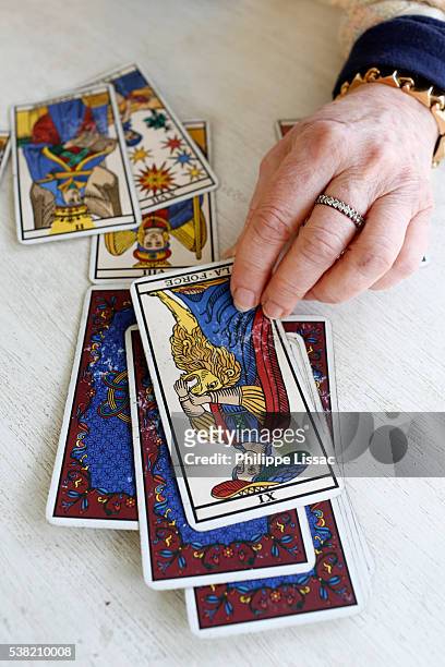 tarot card reading - tarot cards stock pictures, royalty-free photos & images