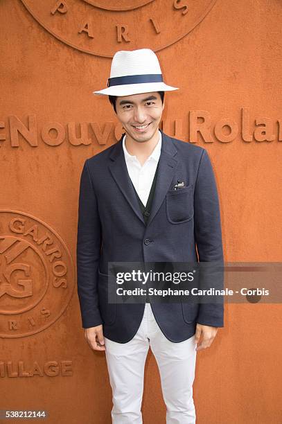 South Korean actor Lee Jin-Wook attends day Fourteen of the 2016 French Open at Roland Garros on June 4, 2016 in Paris, France.