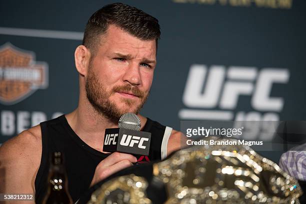 Michael Bisping speaks to the media during the post fight press conference after the UFC 199 event at The Forum on June 4, 2016 in Inglewood,...