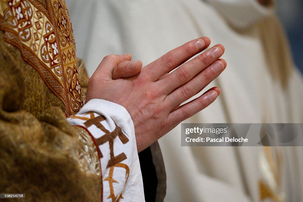 Priest praying.