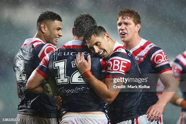 Daniel Tupou, Aidan Guerra, Ryan Matterson and Dylan Napa of the Roosters celebrate Aidan Guerra scoring a try during the round 13 NRL match between...