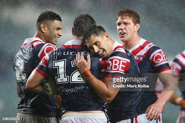 Daniel Tupou, Aidan Guerra, Ryan Matterson and Dylan Napa of the Roosters celebrate Aidan Guerra scoring a try during the round 13 NRL match between...