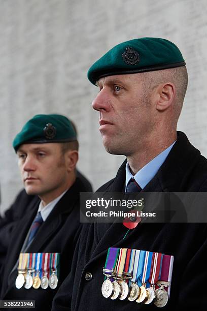poppy parade in ypres on armistice day - ieper stock pictures, royalty-free photos & images