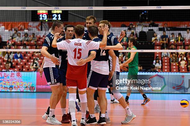 Players of Australia celebrate a point during the Men's World Olympic Qualification game between Australia and Poland at Tokyo Metropolitan Gymnasium...