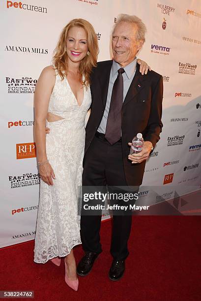 Actress/model Alison Eastwood and father, actor/director Clint Eastwood attend the 2nd Annual Art for Animals fundraiser art event hosted by Alison...