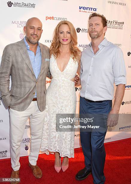 Gallery owner Steph Sebbag, actress/model Alison Eastwood and husband Stacy Poitras attend the 2nd Annual Art for Animals fundraiser art event hosted...