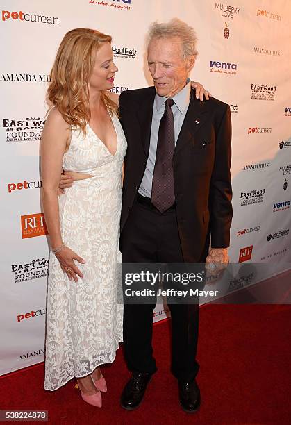 Actress/model Alison Eastwood and father, actor/director Clint Eastwood attend the 2nd Annual Art for Animals fundraiser art event hosted by Alison...