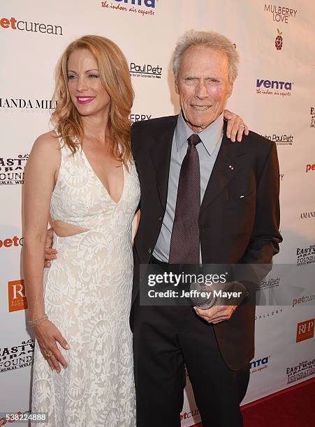 Actress/model Alison Eastwood and father, actor/director Clint Eastwood attend the 2nd Annual Art for Animals fundraiser art event hosted by Alison...