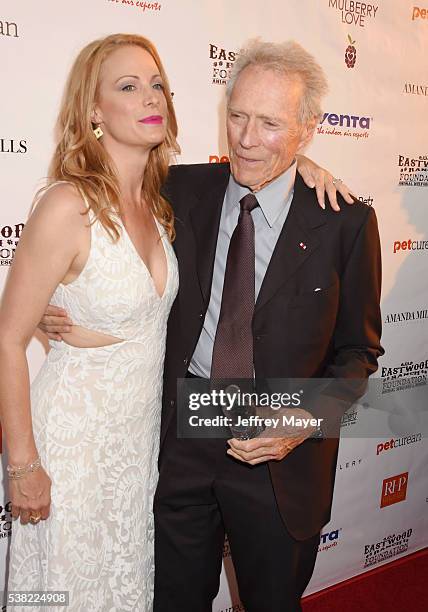 Actress/model Alison Eastwood and father, actor/director Clint Eastwood attend the 2nd Annual Art for Animals fundraiser art event hosted by Alison...