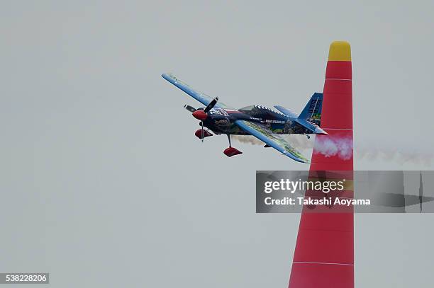 Petr Kopfstein of Czech Republic performs during the round of 14 stage of the Red Bull Air Race Chiba 2016 at Chiba Makuhari Seaside Park on June 5,...