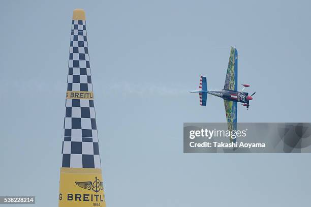 Petr Kopfstein of Czech Republic performs during the round of 14 stage of the Red Bull Air Race Chiba 2016 at Chiba Makuhari Seaside Park on June 5,...