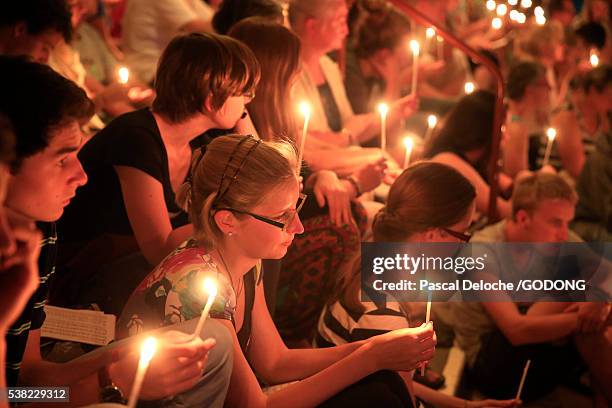 taize community. church of the reconciliation. saturday evening prayers. - ecumenism stock pictures, royalty-free photos & images