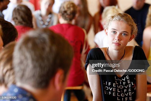 taize ecumenical community. small discussion group. - ecumenism stock pictures, royalty-free photos & images