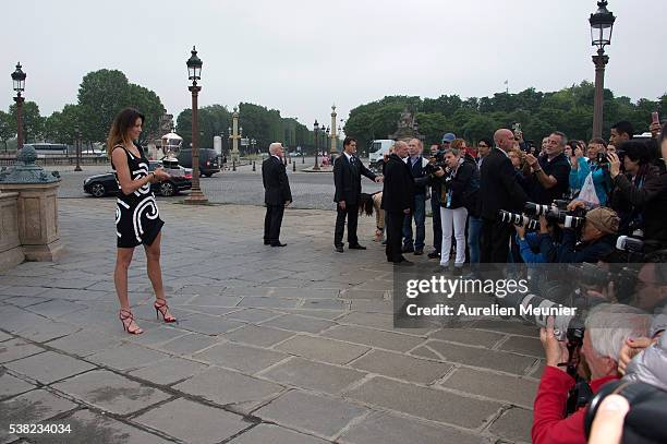 Garbine Muguruza of Spain poses with La Coupe Suzanne Lenglen after winning the women's final at the French Open at Place de la Concorde on June 5,...