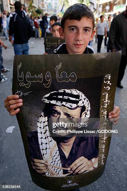 demonstration in ramallah on the tenth anniversary of yasser arafat's death. - palestinian boy stock pictures, royalty-free photos & images