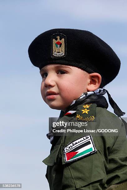 demonstration in ramallah on the tenth anniversary of yasser arafat's death. - palestinian boy stock pictures, royalty-free photos & images