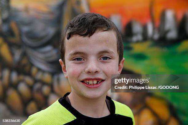 palestinian boy in qalandiya, west bank, palestine. - palestinian boy stock pictures, royalty-free photos & images