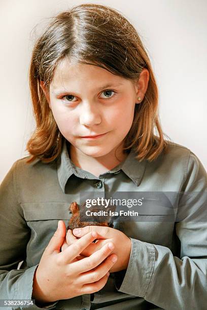 Squirrel baby of the award winner 'Eichhörnchen Schutz e. V.'' in the hand of the girl Julia Rieden during the 'HelpingVets' Award For Animal Welfare...