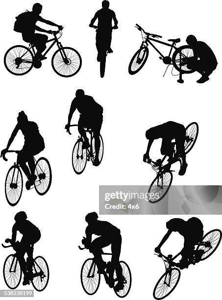 people riding bicycles - cyclist stock illustrations