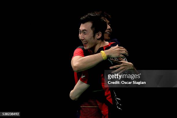 Lee Yong Dae and Yoo Yeon Seong of South Korea celebrate winning the 2016 Indonesia Open final match in man double against Chai Biao and Hong Wei of...