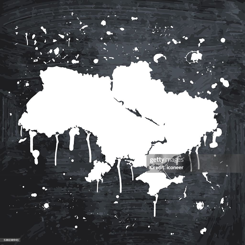 Ukraine map graffiti white splats on black wall