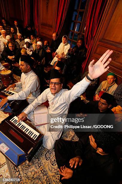 qawali singers performing at a sufi meeting in nandy castle, france. - sufi stock pictures, royalty-free photos & images