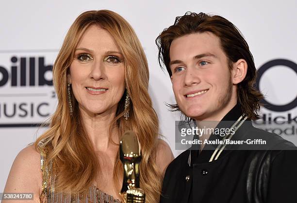 Singer Celine Dion and son Rene Charles Angelil pose in the press room at the 2016 Billboard Music Awards at T-Mobile Arena on May 22, 2016 in Las...