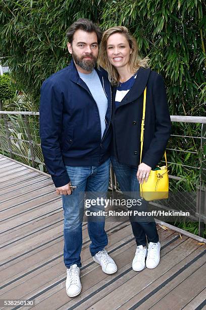 Actors Clovis Cornillac and his wife Lilou Fogli attend Day Fifteen, Men single's Final of the 2016 French Tennis Open at Roland Garros on June 5,...