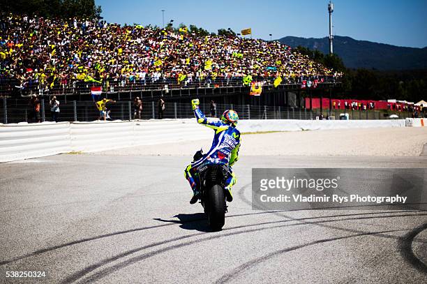 Valentino Rossi of Italy and Movistar Yamaha MotoGP celebrates after winning the MotoGP of Catalunya at Circuit de Barcelona on June 05, 2016 in...