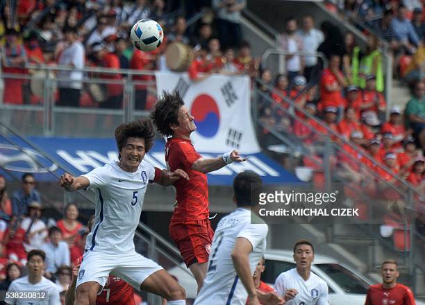 Josef Sural of Czech Republic vies with Kwak of South Korea during their friendly football match on June 5, 2016 in Prague, ahead of the Euro 2016...