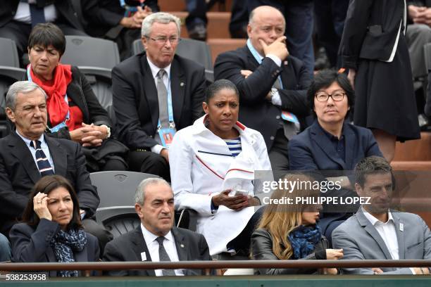 Paris' Mayor Anne Hidalgo, president of the Federation Francaise de Tennis Jean Gachassin, French violonist and French Prime Minister wife Anne...