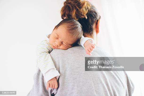 newborn boy sleeping - baby stock-fotos und bilder