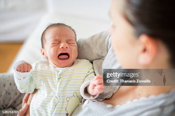 newborn child crying - thanasis zovoilis stock pictures, royalty-free photos & images