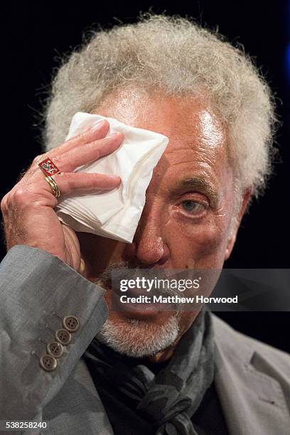 Sir Tom Jones appears to fight back tears during the 2016 Hay Festival on June 5, 2016 in Hay-on-Wye, Wales. This is the Welsh singer's first public...