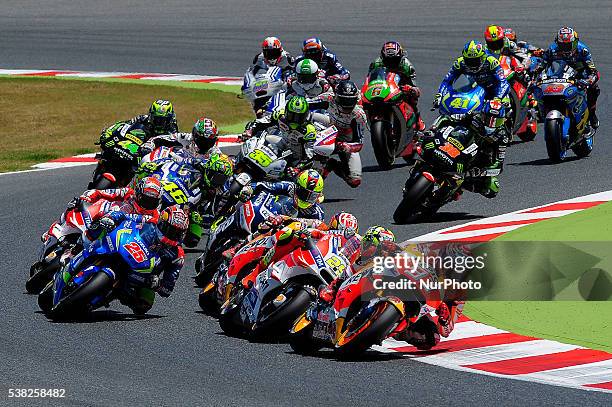 All the MotoGP riders, at the first lap during the MotoGP race at GP Monster Energy of Catalonia, June 5, 2016 in Barcelona, Spain.