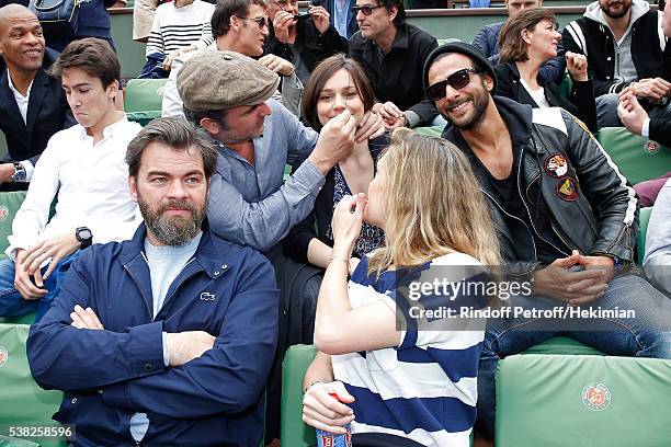 Actor Jean Dujardin, Nathalie Pechalat, singer Maxime Nucci, actors Clovis Cornillac and his wife Lilou Fogli attend Day Fifteen, Men single's Final...