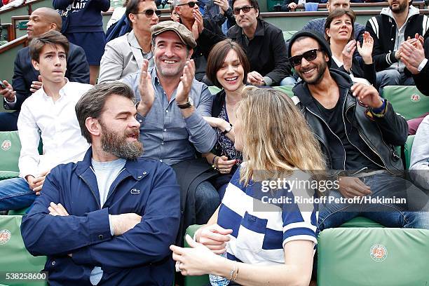 Actor Jean Dujardin, Nathalie Pechalat, singer Maxime Nucci, actors Clovis Cornillac and his wife Lilou Fogli attend Day Fifteen, Men single's Final...