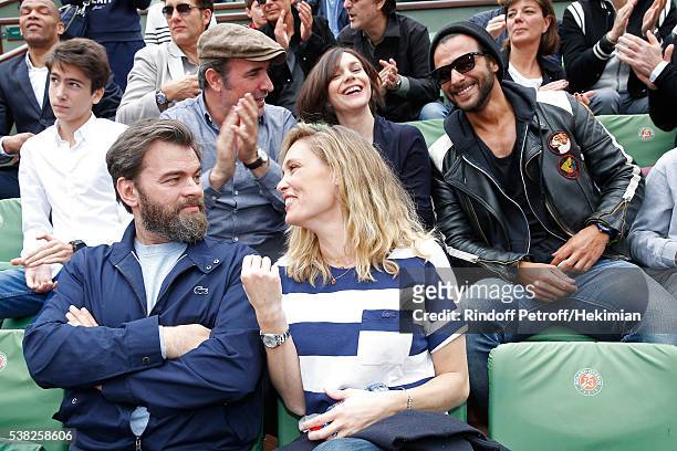 Actor Jean Dujardin, Nathalie Pechalat, singer Maxime Nucci, actors Clovis Cornillac and his wife Lilou Fogli attend Day Fifteen, Men single's Final...