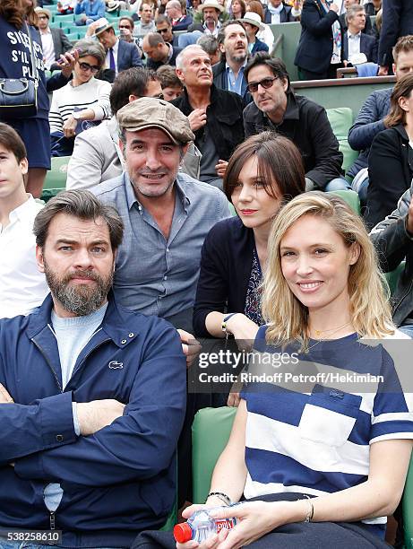 Actor Jean Dujardin, Nathalie Pechalat, actors Clovis Cornillac and his wife Lilou Fogli attend Day Fifteen, Men single's Final of the 2016 French...