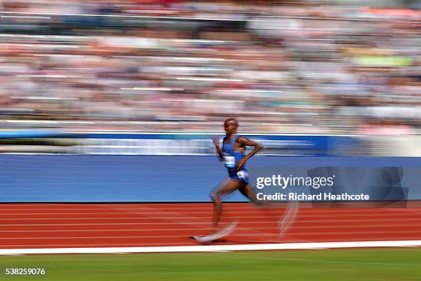 Mo Farah of GB on his way to setting a new British 3000m record during the IAAF Diamond League meeting at Alexander Stadium on June 5, 2016 in...