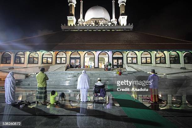 Muslims perform the first 'Tarawih' prayer on the eve of the Islamic holy month of Ramadan at the Great Mosque of Central Java in Semarang, Central...