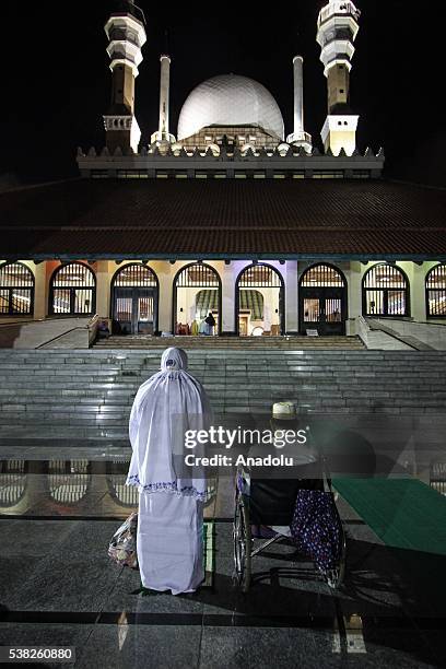 Muslims perform the first 'Tarawih' prayer on the eve of the Islamic holy month of Ramadan at the Great Mosque of Central Java in Semarang, Central...